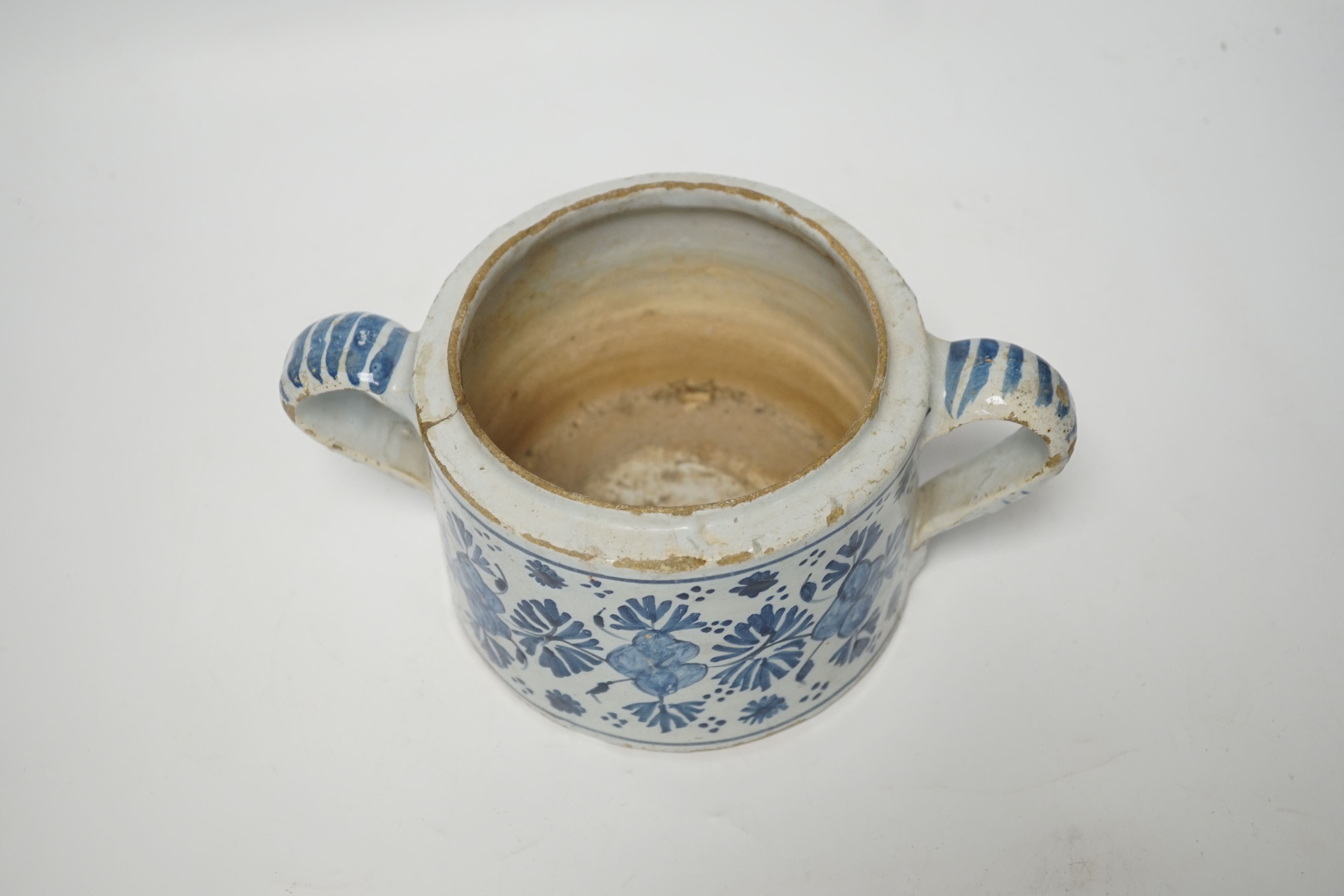 A Delft two handled posset pot, c.1680-1700, 23cm wide including handles